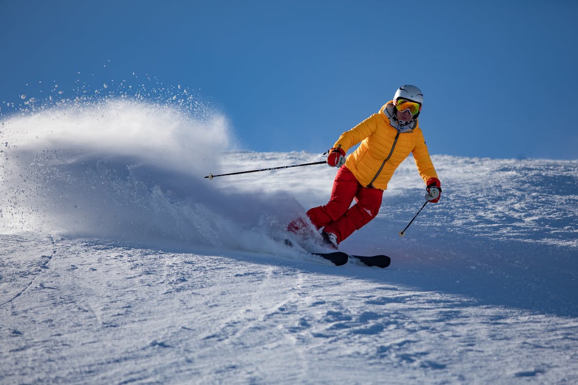 Skiers gliding down snow-covered slopes at Mt. Buller